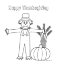 scarecrow with wheat sheaf and pumpkin